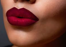 Burgundy red lipstick is coming back to hit again